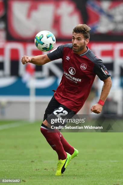 Enrico Valentini of 1. FC Nuernberg plays the ball during the Second Bundesliga match between SSV Jahn Regensburg and 1. FC Nuernberg at Continental...
