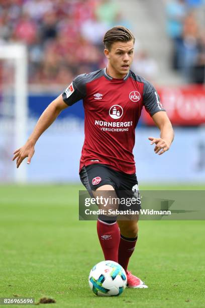 Patrick Kammerbauer of 1. FC Nuernberg plays the ball during the Second Bundesliga match between SSV Jahn Regensburg and 1. FC Nuernberg at...