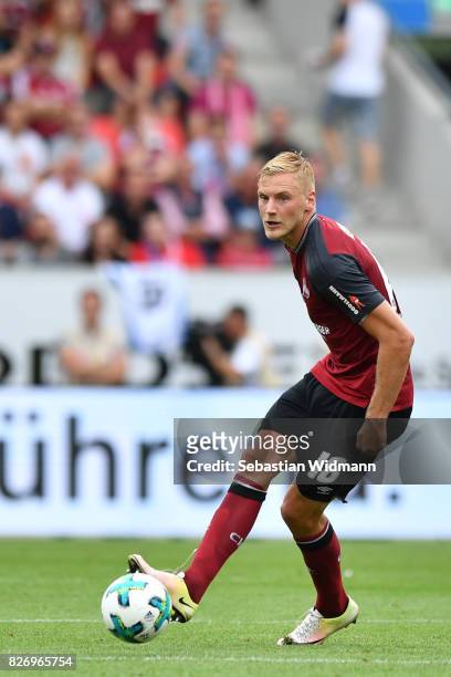 Hanno Behrens of 1. FC Nuernberg plays the ball during the Second Bundesliga match between SSV Jahn Regensburg and 1. FC Nuernberg at Continental...