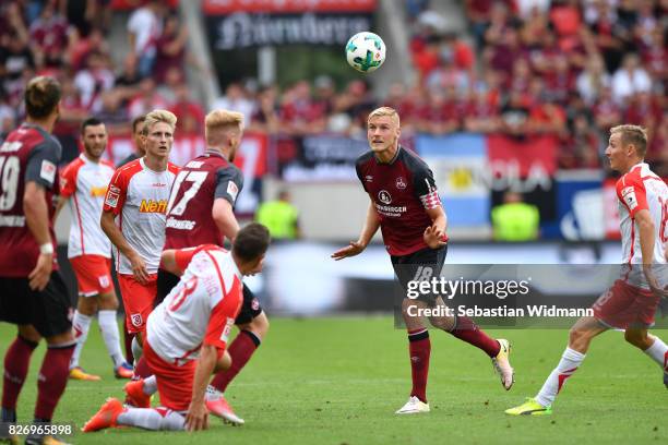 Hanno Behrens of 1. FC Nuernberg goes for a header during the Second Bundesliga match between SSV Jahn Regensburg and 1. FC Nuernberg at Continental...