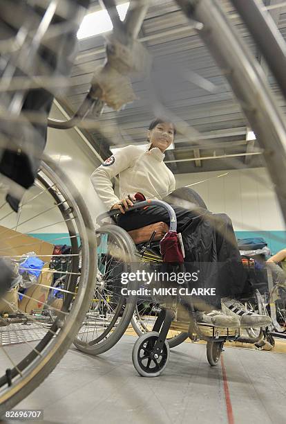 To go with AFP story "Paralympics-2008-CHN-HKG-fencing,FEATURE" by JOHN SAEKI Paralympian fencer Yu Chui Yee poses prior to a training session at the...