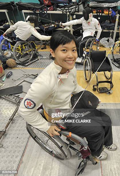 To go with AFP story "Paralympics-2008-CHN-HKG-fencing,FEATURE" by JOHN SAEKI Paralympian fencer Yu Chui Yee poses prior to a training session at the...