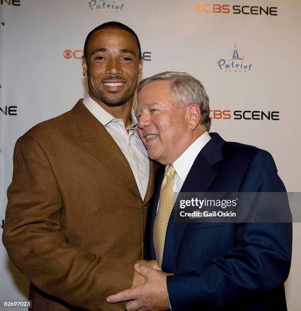 Rodney Harrison of the New England Patriots and Chairman and CEO of the Kraft Group Robert Kraft attends the grand opening of the CBS Scene...