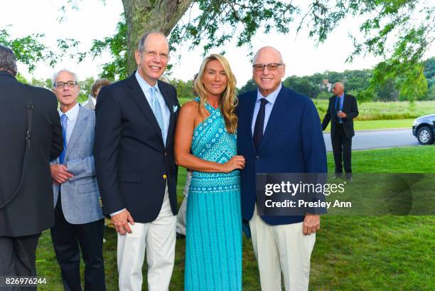 Susan Bourdeau, Howard Lorber and Bob Chaloner attend Southampton Hospital 59th Annual Summer Party on August 5, 2017 in Southampton, New York.