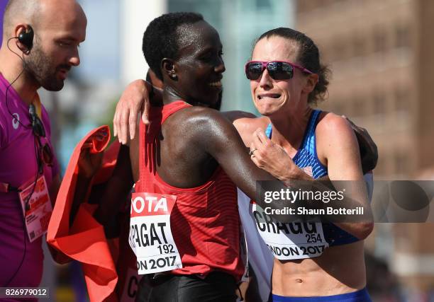Edna Ngeringwony Kiplagat of Kenya, second place, and Amy Cragg of the United States, third place, celebrate after the Women's Marathon during day...