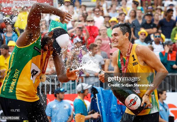 Gold medalist Evandro and Andre Loyola of Brazil celebrate during the medal ceremony for the Men's Final on August 06, 2017 in Vienna, Austria.