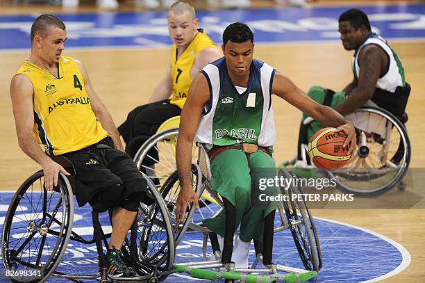 Irio Nunes of Brazil controls the ball against Australia in their Group B basketball game at the 2008 Beijing Paralympic Games on September 7, 2008....