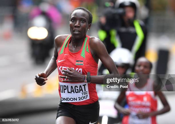 Kenya's Edna Ngeringwony Kiplagat leads Bahrain's Rose Chelimo in the Women's Marathon during day three of the 16th IAAF World Athletics...