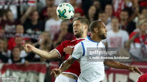 Terrence Boyd of Darmstadt challenges Vucur Stipe of Kaiserslautern during the Second Bundesliga match between 1. FC Kaiserslautern and SV Darmstadt...