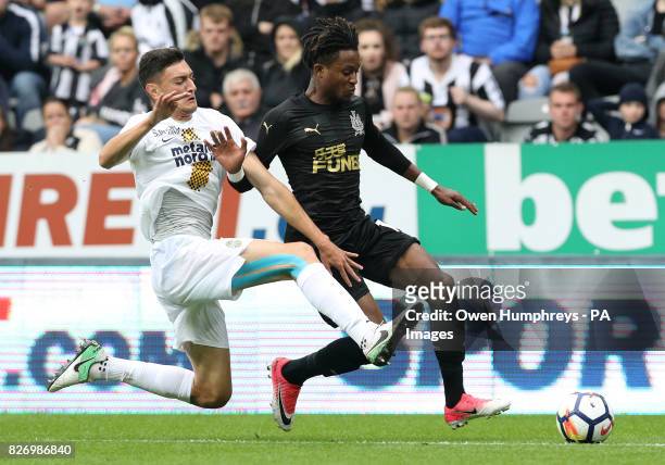 Newcastle's Rolando Aarons and Hellas Verona's Daniel Bessa battle for the ball during the pre-season friendly at St Jamesâ Park, Newcastle.