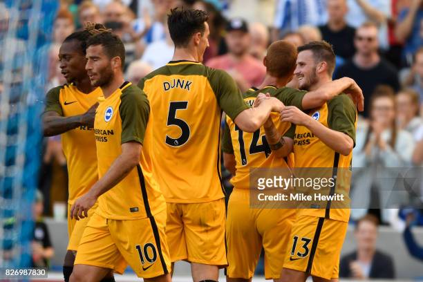 Pascal Gross of Brighton celebrates with team mates after scoring during a Pre Season Friendly between Brighton & Hove Albion and Atletico Madrid at...