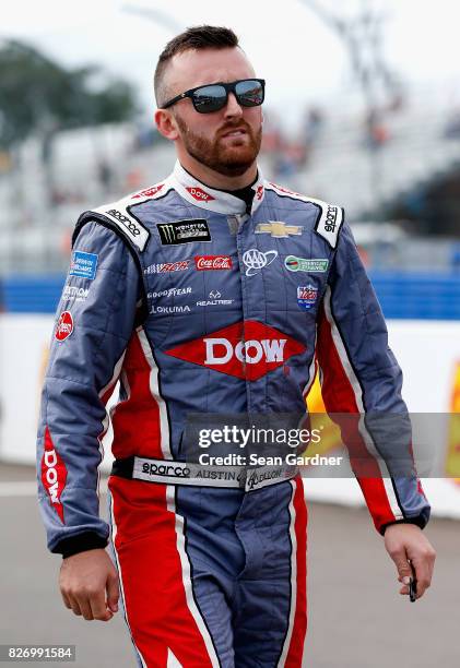 Austin Dillon, driver of the Dow STEM Chevrolet, walks down pit road during qualifying for the Monster Energy NASCAR Cup Series I Love NY 355 at The...