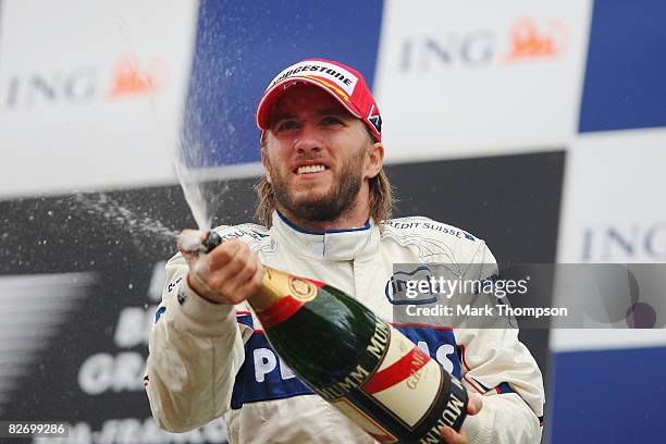 Nick Heidfeld of Germany and BMW Sauber celebrates finishing third in the Belgian Grand Prix at the Circuit of Spa Francorchamps on September 7, 2008...