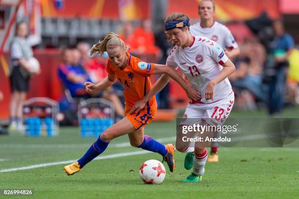 Jackie Groenen of Netherlands in action against Sofie Pedersen of Denmark during the Final match of the UEFA Women's Euro 2017 between Netherlands...