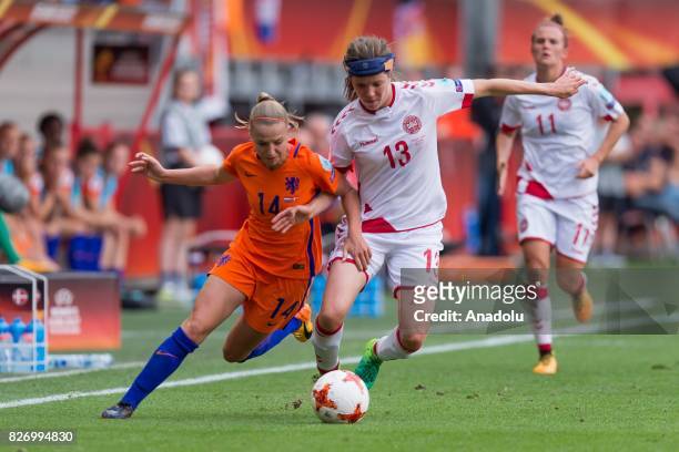 Jackie Groenen of Netherlands in action against Sofie Pedersen of Denmark during the Final match of the UEFA Women's Euro 2017 between Netherlands...