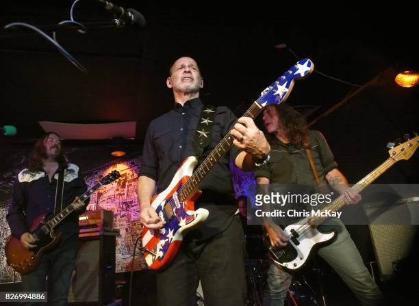 Adam McIntyre, Wayne Kramer, Adam Renshaw, and Shannon Mulvaney perform during the Artist2Artist Benefit For Homeless Veterans at The Office on...