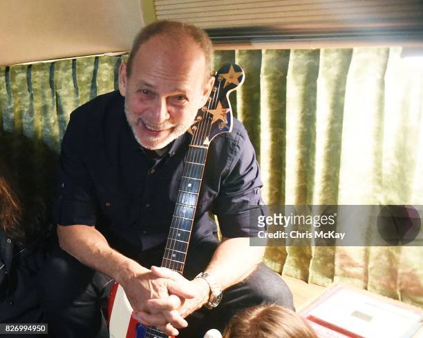 Wayne Kramer from MC5 backstage with his famous American Flag Fender Statocaster at The Office on August 5, 2017 in Athens, Georgia.