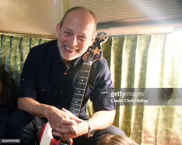 Wayne Kramer from MC5 backstage with his famous American Flag Fender Statocaster at The Office on August 5, 2017 in Athens, Georgia.