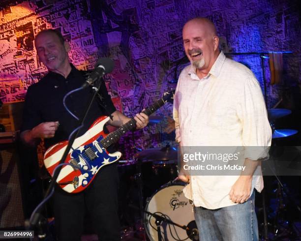 Wayne Kramer and Peter Holsapple perform during the Artist2Artist Benefit For Homeless Veterans at The Office on August 5, 2017 in Athens, Georgia.