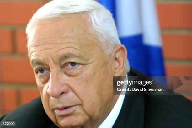 Israeli Prime Minister-elect Ariel Sharon talks with United States Ambassador to Israel Martin Indyk at the start of their meeting March 4, 2001 in...