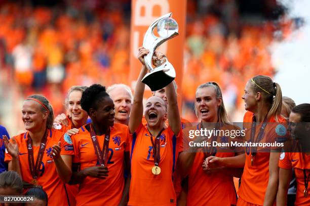 Jackie Groenen of the Netherlands lifts the trophy following the Final of the UEFA Women's Euro 2017 between Netherlands v Denmark at FC Twente...