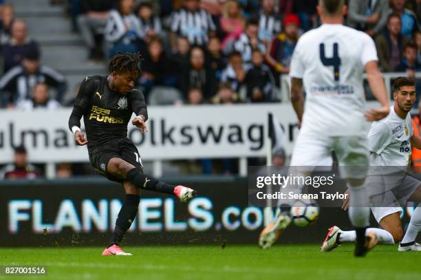 Rolando Aarons of Newcastle United strikes the ball during the Pre Season Friendly match between Newcastle United and Hellas Verona at St.James' Park...