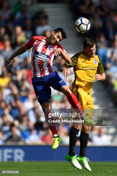 Nicolas Gaitan of Atletico Madrid challenges Pascal Gross of Brighton during a Pre Season Friendly between Brighton & Hove Albion and Atletico Madrid...