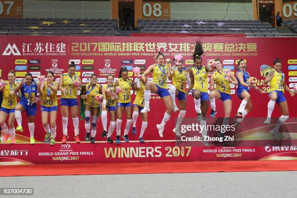 Players of Brazil celebrate winning with trophy after winning the final match between Brazil and Italy during 2017 Nanjing FIVB World Grand Prix...