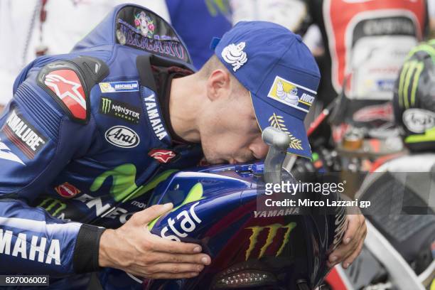 Maverick Vinales of Spain and Movistar Yamaha MotoGP kiss the bike and celebrates the third place at the end of the MotoGP race during the MotoGp of...
