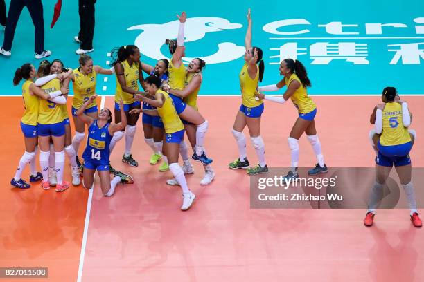 Players of Brazil celebrate after winning 2017 Nanjing FIVB World Grand Prix Finals between Italy and Brazil on August 6, 2017 in Nanjing, China.