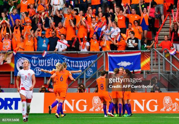 Netherlands' forward Vivianne Miedema celebrates with teammates after scoring a goal during the UEFA Womens Euro 2017 football tournament final match...