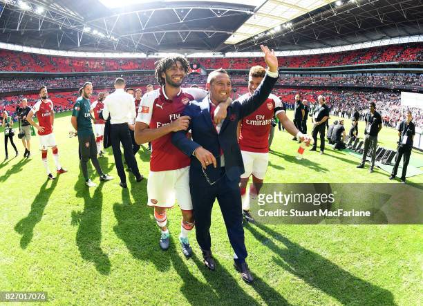 Mohamed Elneny and Santi Cazorla after the FA Community Shield match between Chelsea and Arsenal at Wembley Stadium on August 6, 2017 in London,...
