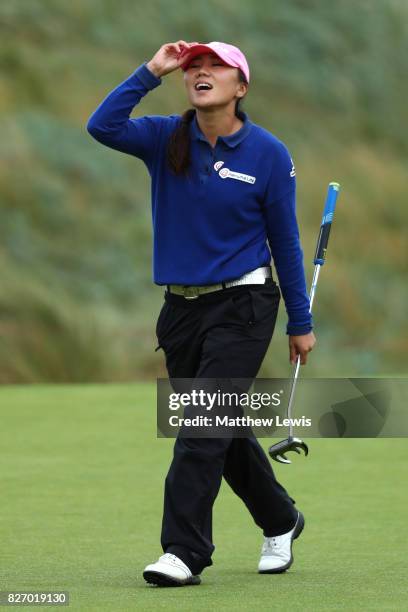 In-Kyung Kim of Korea reacts to a putt on the 16th green during the final round of the Ricoh Women's British Open at Kingsbarns Golf Links on August...