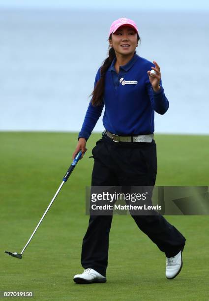 In-Kyung Kim of Korea acknowledges the crowd on the 17th green during the final round of the Ricoh Women's British Open at Kingsbarns Golf Links on...