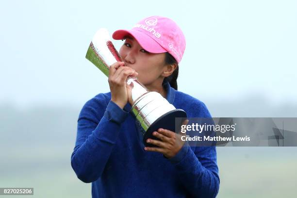 In-Kyung Kim of Korea poses with the trophy following her victory during the final round of the Ricoh Women's British Open at Kingsbarns Golf Links...