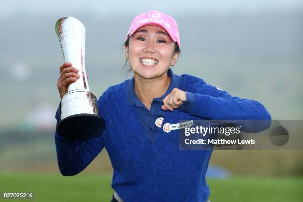 In-Kyung Kim of Korea poses with the trophy following her victory during the final round of the Ricoh Women's British Open at Kingsbarns Golf Links...