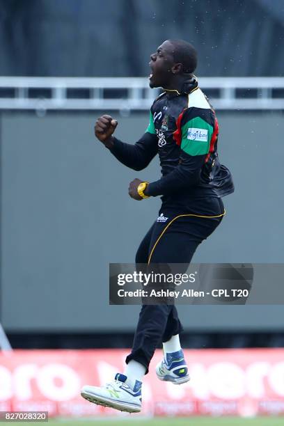 In this handout image provided by CPL T20,Carlos Brathwaite of St Kitts and Nevis Patriots celebrates winning the match in the final over during...