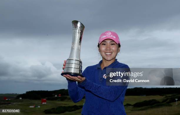 In-Kyung Kim of South Korea holds the trophy after her victory during the final round of the Ricoh Women's British Open at Kingsbarns Golf Links, on...