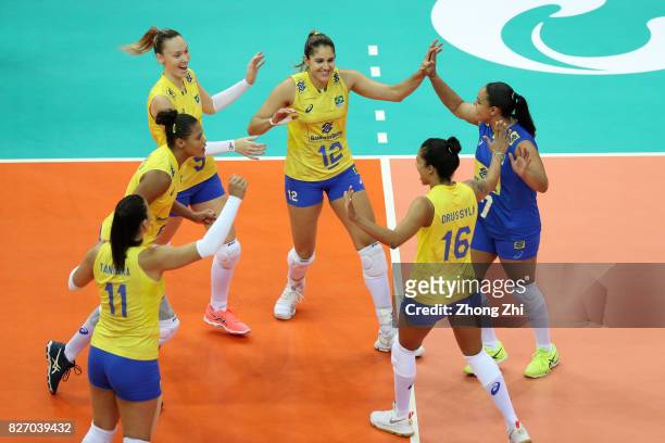 Adenizia Da Silva, #9 Roberta Silva Ratzke, #11 Tandara Caixeta, #12 Natalia Pereira, #16 Drussyla Costa and Suelen Pinto of Brazil celebrate a point...