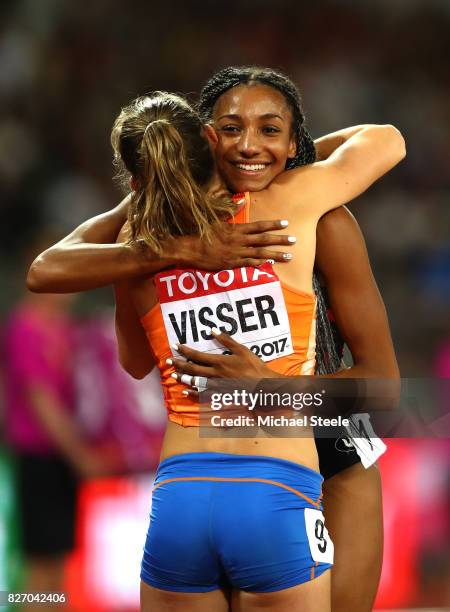 Nadine Visser of the Netherlands hugs Nafissatou Thiam of Belgium celebrates after the Women's Heptathlon 800 metres and Thiam winning gold in the...