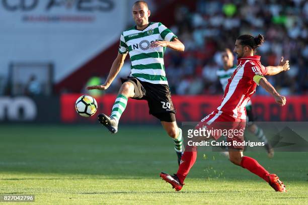 Sporting CP forward Bas Dost from Holland vies with Aves defender Nelson Lenho from Portugal during the match between Desportivo das Aves vs Sporting...