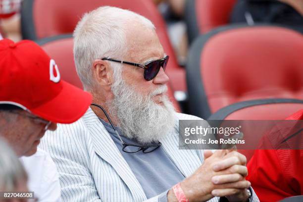 Former late night television host David Letterman attends a game between the St. Louis Cardinals and Cincinnati Reds at Great American Ball Park on...