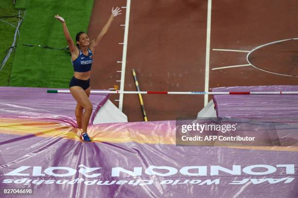 Venezuela's Robeilys Peinado waves after the final of the women's pole vault athletics event at the 2017 IAAF World Championships at the London...