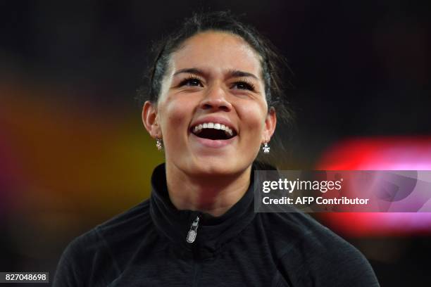 Venezuela's Robeilys Peinado celebrates bronze after the final of the women's pole vault athletics event at the 2017 IAAF World Championships at the...