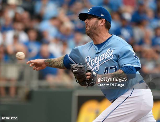 Peter Moylan of the Kansas City Royals throws in the sixth inning against the Seattle Mariners in game one of a doubleheader at Kauffman Stadium on...
