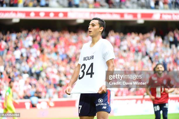 After putting his side 3-0 ahead, Anwar El Ghazi of Lille removes his shirt to reveal a t-shirt paying tribute to former Ajax team mate Abdelhak...