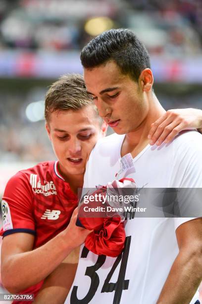 After putting his side 3-0 ahead, Anwar El Ghazi of Lille removes his shirt to reveal a t-shirt paying tribute to former Ajax team mate Abdelhak...