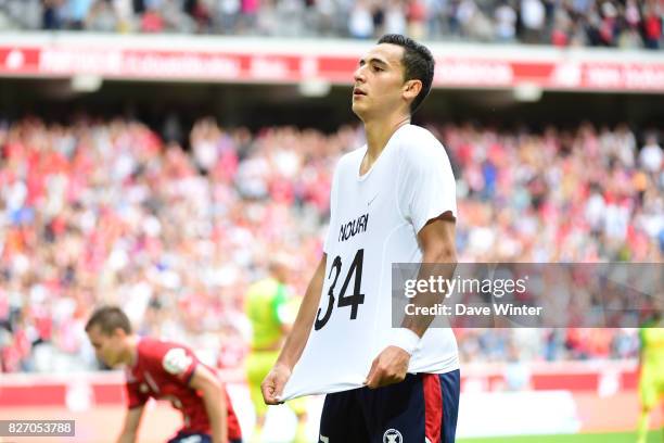 After putting his side 3-0 ahead, Anwar El Ghazi of Lille removes his shirt to reveal a t-shirt paying tribute to former Ajax team mate Abdelhak...