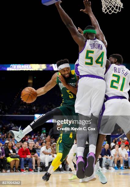 Xavier Silas of the Ball Hogs is blocked as he drives to the basket by Kwame Brown of the 3 Headed Monsters at Rupp Arena on August 6, 2017 in...