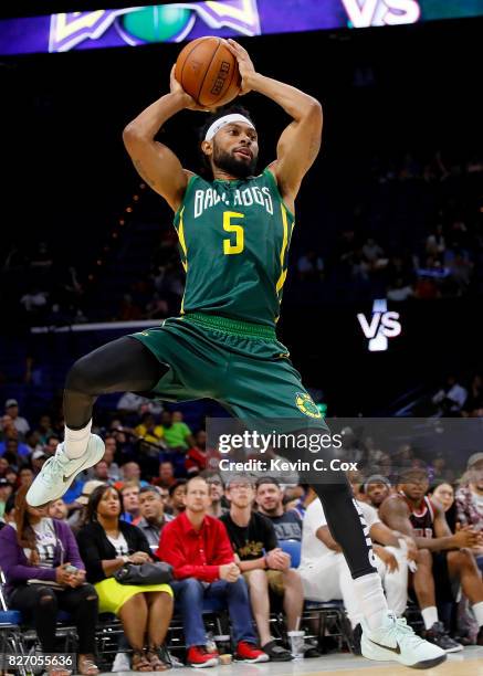 Xavier Silas of the Ball Hogs passes the ball during the game against the 3 Headed Monsters during week seven of the BIG3 three on three basketball...